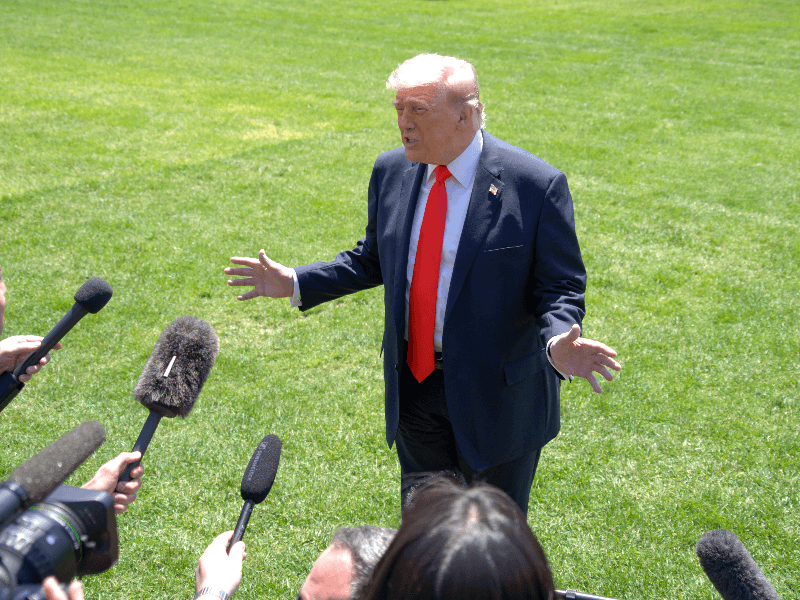 President Donald Trump speaks during a public event in Washington, D.C., as new polling shows declining approval ratings amid voter concerns over inflation and the economy.