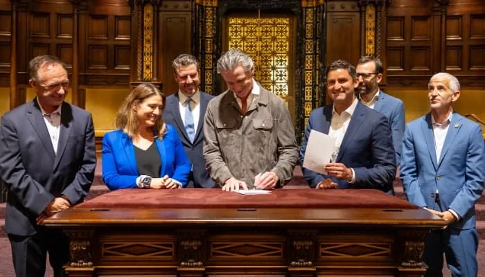California Governor Gavin Newsom signs the two bills